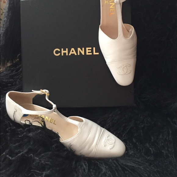 CHANEL Shoes - Beautiful Chanel white shoes with strap .